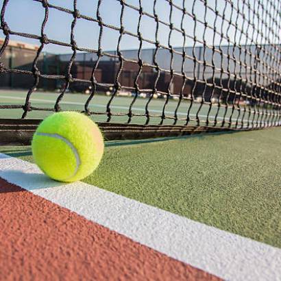 Tennis court with tennis ball close up
